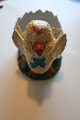 Figurine for the EasternAn old figurine made of bisquit made as a chicken with an eggIt is ...