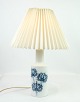 This vintage table lamp is a beautiful example of Danish design from the mid-20th century. The ...