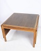 This coffee table in mahogany / walnut is model 5362, designed by the famous Danish furniture ...