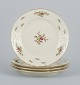Rosenthal, Germany. "Sanssouci", four cream colored plates decorated with flowers and gold ...