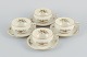 Rosenthal, Germany. "Sanssouci", four cream colored teacups with  saucers decorated with flowers ...