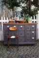 Old, 1800s grocery counter with a total of 15 drawers, some with old white porcelain signs.The ...