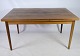 Dining table by a Danish cabinetmaker in rosewood with Dutch extension from around the 1960s. ...