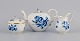 Meissen, Germany, teapot, creamer and sugar bowl.Hand painted in blue with flowers and ...