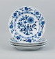 Meissen, Blue Onion pattern, a set of four hand painted dinner plates.Early 20th ...