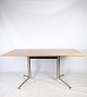 Spinal dining table, designed by Paul Leroy with oak table top and matt chromed steel frame made ...