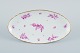 Royal 
Copenhagen, 
oval dish hand 
painted with 
purple flowers 
and gold rim.
Approx. 1900.
First ...