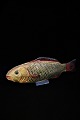 Decorative 
1800s "fish" in 
painted 
papier-mâché 
with glass eyes 
and a really 
nice patina. 
...