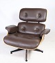 Charles Eames Lounge chair in brown leather and light walnut produced by Herman Miller designed ...