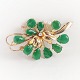 W. & S. Sørensen; A brooch set with jade, a diamond and pearls mounted in 14k gold.App. 5,5 cm ...