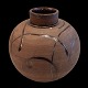 Herman A. Kähler; A big round pottery vase. Decorated in brown colours. H. 27,5 cm. Diam. app. ...