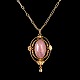Georg Jensen; A necklace in 18k gold set with a rose quartz. Original necklace l. 44 ...