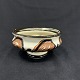 Height 7 cm.Diameter 13 cm.Beautiful cow horn decorated bowl from Kähler.The bowl is ...