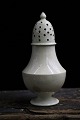 Rare large old French salt shaker in cream colored earthenware with fine patina. Height:15,5 cm. ...
