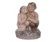 Rare Royal Copenhagen miniature figurine, Faun with girl.The factory mark tells, that this ...