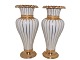 Pair of Royal Copenhagen tall Hetsch vases with wide gold edges.The vase was designed by ...