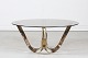 Roger Sprunger 
(1920-2008)
Coffee table 
with frame of 
brass
and tabletop 
of smoke 
colored ...