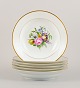 Bing & 
Grøndahl, six 
deep plates in 
porcelain 
hand-painted 
with polychrome 
flowers and 
gold ...