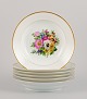 Bing & 
Grøndahl, six 
deep plates in 
porcelain 
hand-painted 
with polychrome 
flowers and 
gold ...