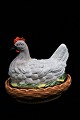 Antique 
earthenware egg 
hen from 
Rörstrand, 
finely painted 
with a really 
nice old 
patina. H: 22 
...