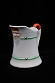 Antique earthenware Christmas jug from Rörstrand with elves on the handle and on the front. ...