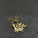 Length 6 cm.Length of chain 60 cm.Unusually detailed pendant in brass. The chain is ...