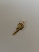 Key in 
Charms/Pendant 
#14 carat Gold
Stamped 585
Goldsmith: 
unknown
Height 1.8 mm
Height ...