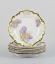 P. Dauphin, 
Paris, a set of 
six Art Nouveau 
faience plates 
decorated with 
flowers and 
gold ...