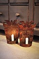 A pair of antique 19th century Swedish wall candlesticks in metal with old paint and with a ...