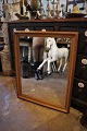 Antique, French 19th century mirror with fine decorated gold frame with a fine patina, as well ...