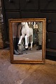 Antique French 1800s square mirror with decorated gold frame with a fine old patina and with ...
