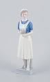Royal 
Copenhagen, 
rare porcelain 
figurine of a 
nurse.
Model: 
4507/156.
In perfect ...