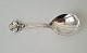 Serving spoon 
in silver 
beautifully 
decorated with 
flower 
Stamped the 
three towers 
1930 - ...