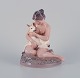 Dahl Jensen 
porcelain 
figurine, girl 
with fawn.
No. 1276.
First factory 
quality.
Marked.
In ...