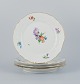 Royal 
Copenhagen, 
four Saxon 
Flower dinner 
plates. 
Hand-painted 
with different 
polychrome ...