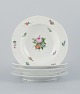 Royal 
Copenhagen, set 
of four rare 
and antique 
Saxon Flower 
porcelain 
plates. 
Hand-painted 
with ...