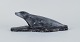 Greenlandica, Ortôrak, large sculpture of a lying seal made of soapstone.In good condition ...