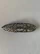 Brooch in 
Silver
Stamped 925s
Height 19.56 
mm approx
Length 7.5 cm 
approx
Nice and well 
...