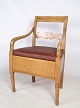 Armchair chair in pine wood with brown leather from around the 1840s. It is in nice ...
