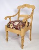 Peasant chair / armchair in pine wood with floral covers from the 1890s. It is in a nicely ...