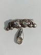 Evald Nielsen 
brooch In the 
moon itself. 
The stone. on 
the left with a 
defect. 5 cm 
wide. ...