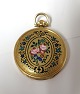 Comor. Women's gold watch 18K (750) with enamel. Diameter 31 mm. The clock works