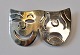 Sterling silver 
brooch with 
theater masks, 
20th century 
Mexico. 
Stamped. TC 
259. H.: 3.3 
cm. W.: ...