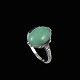 A. Dragsted - 
Copenhagen. 18k 
White Gold Ring 
with Jade and 
two Diamonds.
Two brillant 
cut ...