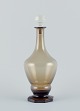 Danish glassworks, mouth-blown Art Deco wine decanter in smoked glass with faceted base.Dating ...