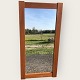 Large mirror in a wide frame of teak wood veneer. Denmark from the 1970s. Dimensions: 122x61 cm. ...