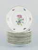 Bing & 
Grøndahl, Saxon 
Flower, a set 
of twelve lunch 
plates.
Approx. 
1920/30s.
Model number 
...