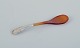 Georg Jensen, 
Viking, rare 
salt spoon with 
amber-colored 
horn handle. 
Sterling 
silver.
Stamped ...