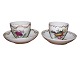 Royal 
Copenhagen two 
antique coffee 
cups with 
saucers. The 
cups are 
decorated with 
...
