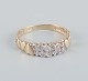 8 karat gold 
ring with 
numerous small 
diamonds in a 
modernist 
design.
Mid-20th 
century.
Makers ...